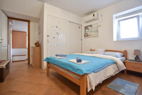 Postel nebo postele na pokoji v ubytování Sailor House