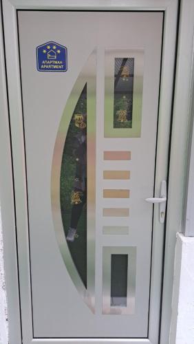 a door with a mirror on the side of it at Vila Raj in Gornja Toplica