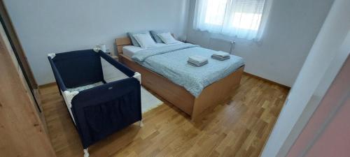 Postel nebo postele na pokoji v ubytování Apartman N&N