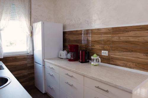 Una cocina o cocineta en Lux 010