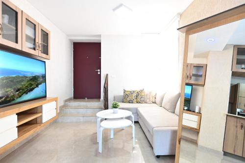 Villa Selavi Private Infinity Poolにあるテレビまたはエンターテインメントセンター