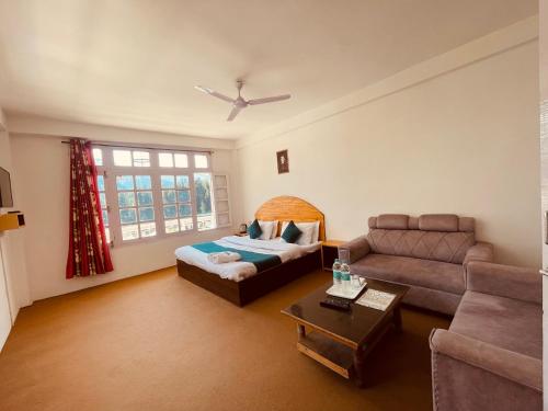 Zona de estar de Hotel Lilly Inn Himalayan Snow views