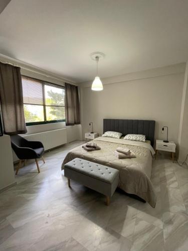Ένα ή περισσότερα κρεβάτια σε δωμάτιο στο Maria's central apartment