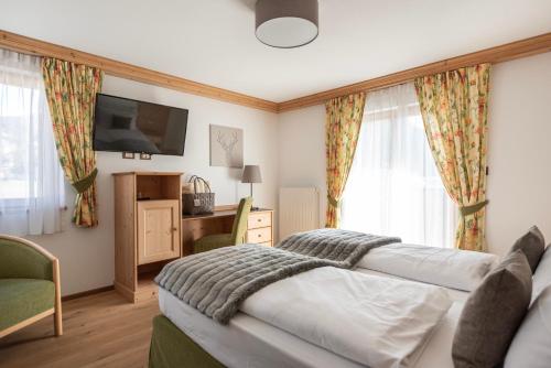 Cama o camas de una habitación en Hotel Cristallo