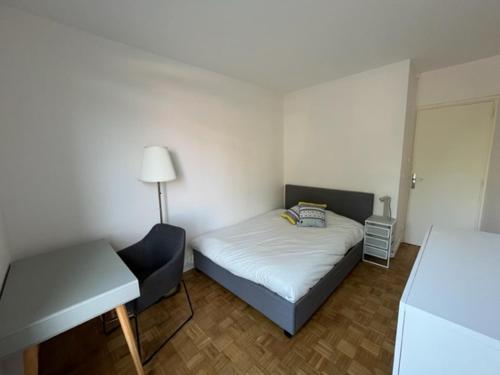 Postel nebo postele na pokoji v ubytování Chambre Lumineuse