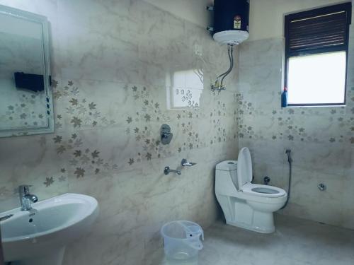 Kúpeľňa v ubytovaní Manalitelugucottages