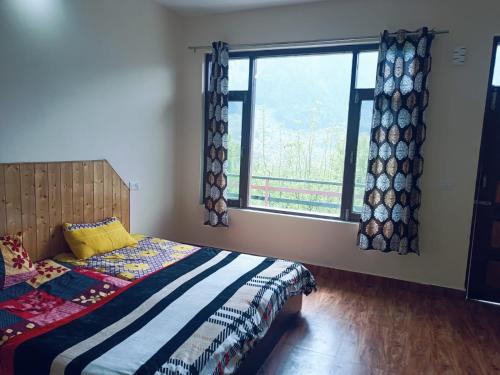 Posteľ alebo postele v izbe v ubytovaní Manalitelugucottages