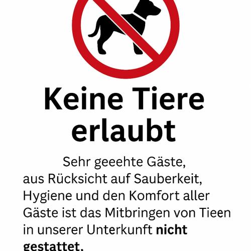 a sign with a picture of a dog in a no dog sign at Wohnungen Beshi Niederthalheim in Vöcklabruck