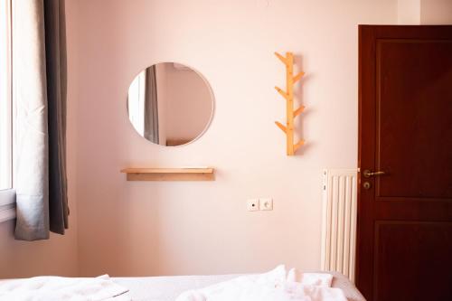 Ένα ή περισσότερα κρεβάτια σε δωμάτιο στο Anemelo luxury apartment with sea view!