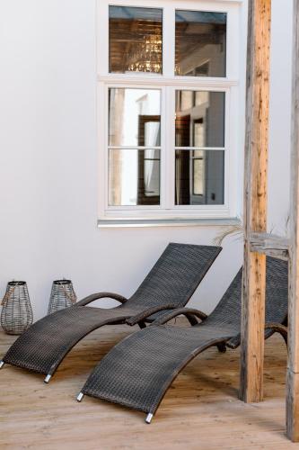 a rendering of a sculpture in front of a window at Black Princess in Cēsis