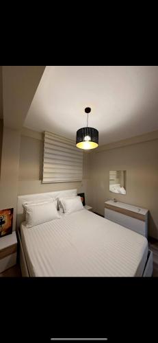 Katil atau katil-katil dalam bilik di Marina Bay Apartament 1