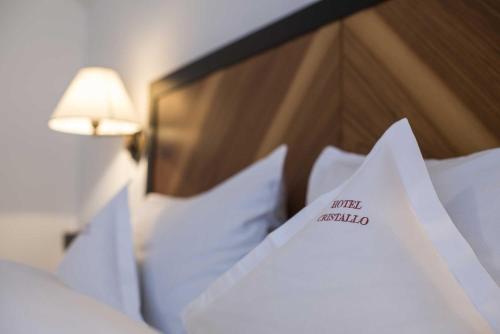 Cama o camas de una habitación en Hotel Cristallo