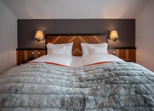 Cama o camas de una habitación en Hotel Cristallo