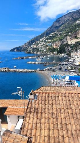 a view of a beach and the ocean from a roof at Casa Nina in Amalfi