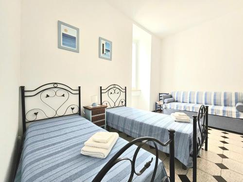 Ένα ή περισσότερα κρεβάτια σε δωμάτιο στο Dimora Torre del Cavaliere