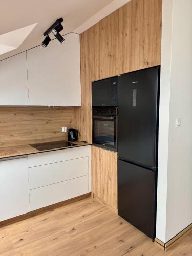 Η κουζίνα ή μικρή κουζίνα στο Apartament Joanna