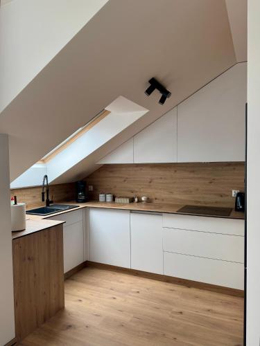 Η κουζίνα ή μικρή κουζίνα στο Apartament Joanna