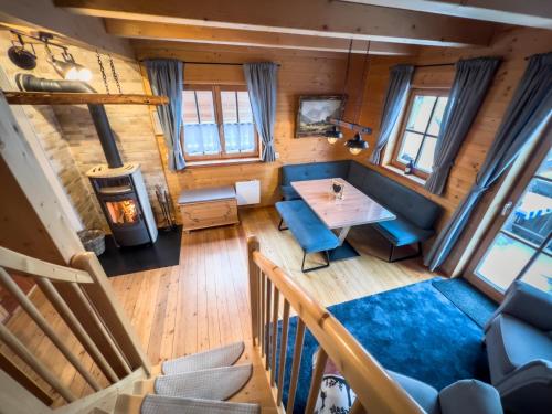 an overhead view of a living room with a table and chairs at Almhütte Falkert in Patergassen