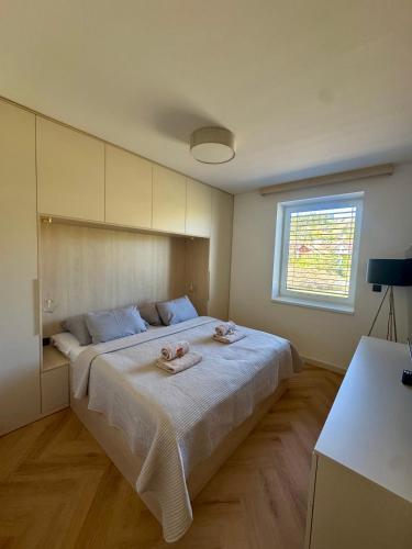 Postel nebo postele na pokoji v ubytování Apartmán Zelené údolie