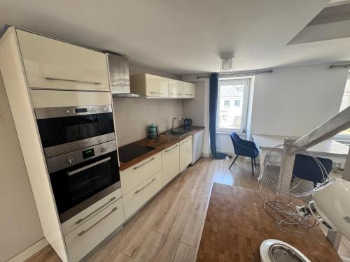 Photo de la galerie de l'établissement Duplex centre bourg à 5min des plages, à Plouguerneau