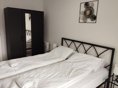 Apartman IDAにあるベッド