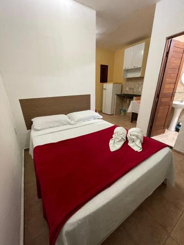 Postel nebo postele na pokoji v ubytování Pousada Flor D' Açucena