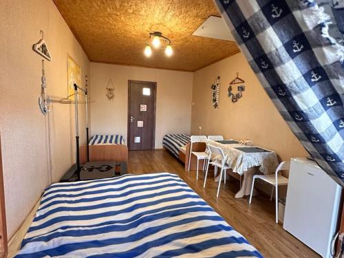 Postel nebo postele na pokoji v ubytování частный дом У Федотовича