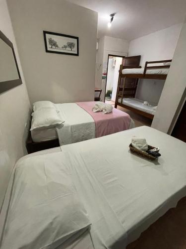 Postel nebo postele na pokoji v ubytování Pousada Flor D' Açucena