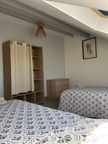 Postel nebo postele na pokoji v ubytování Appartement tout confort, cosy refait à neuf