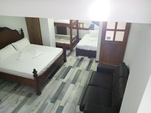 Ένα ή περισσότερα κρεβάτια σε δωμάτιο στο Casa Finca Hotel Loma Encantada