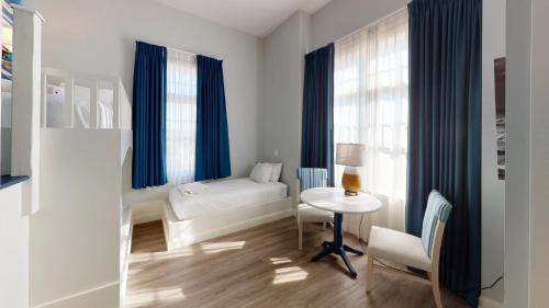 Postel nebo postele na pokoji v ubytování Hotel LBI