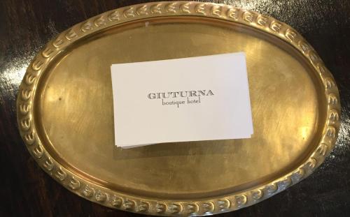 Фотография из галереи Giuturna Boutique Hotel в Риме
