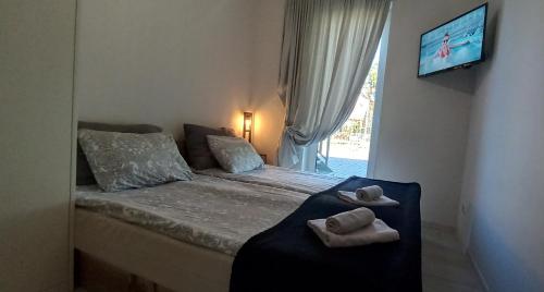 Posteľ alebo postele v izbe v ubytovaní Apartament Koszałka