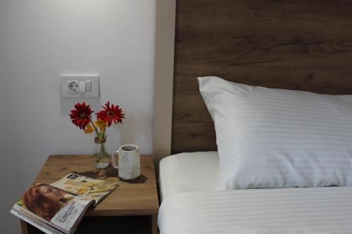 Postel nebo postele na pokoji v ubytování Ciconia Apartments