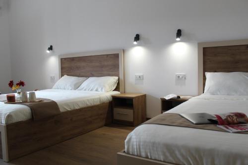 Postel nebo postele na pokoji v ubytování Ciconia Apartments