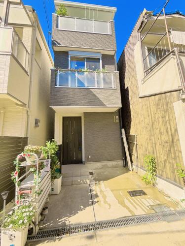 an image of a house with a balcony at 天王寺暖居 in Osaka
