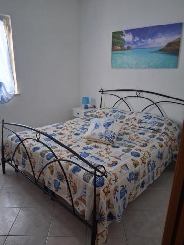 Postel nebo postele na pokoji v ubytování Brezza di Mare
