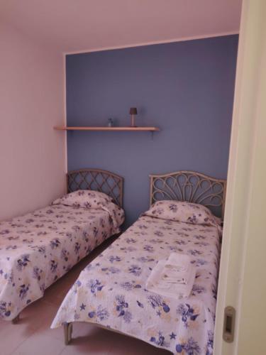 Postel nebo postele na pokoji v ubytování Mare Blu