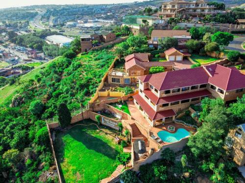 an aerial view of a house on a hill at Heri guest house in Johannesburg