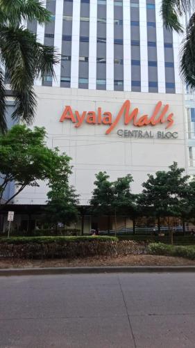 aania mall sign on the side of a building at Kler Condo Garden with City View in Tabok