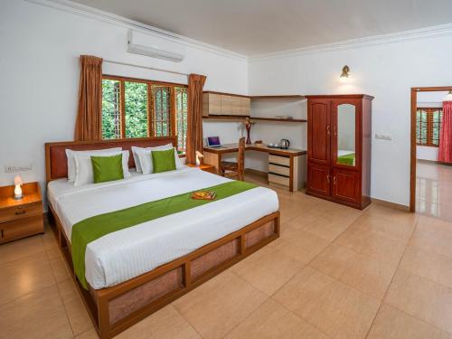 Postel nebo postele na pokoji v ubytování dE Spicewoods, 4BHK Pool Villa, Breakfast