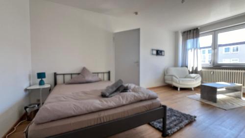 Ένα ή περισσότερα κρεβάτια σε δωμάτιο στο Vida Real Estate Sigmund