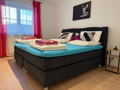 Ένα ή περισσότερα κρεβάτια σε δωμάτιο στο Residenz Göttersitz