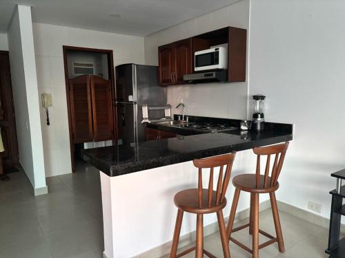 O bucătărie sau chicinetă la Apartamento 804A Cartagena El Laguito Bocagrande a 1 cuadra de la playa hermosa vista
