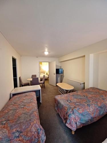 Postel nebo postele na pokoji v ubytování Hotel Koffieboontje