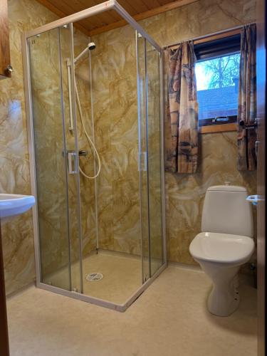 Koupelna v ubytování Hafslo hytteutleige Straumane