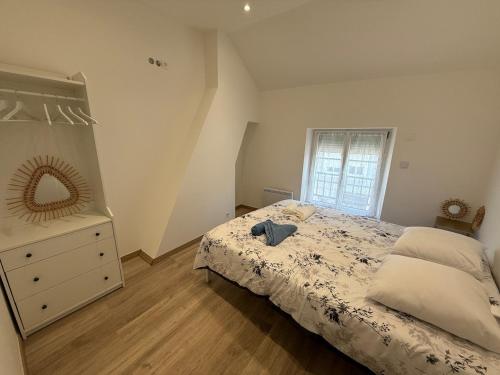 Postel nebo postele na pokoji v ubytování Appartement en champagne