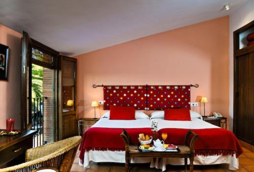 Кровать или кровати в номере Hotel La Garapa
