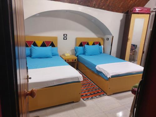 Кровать или кровати в номере Lale Hostel