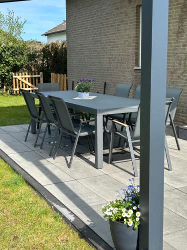 Kawasan patio atau luaran di Ferienhaus "Familytime" mit großem Garten